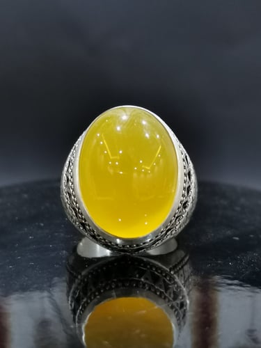 خاتم الفضة بحجر خرساني ايراني أصفر بصياغة الخفاش ا...