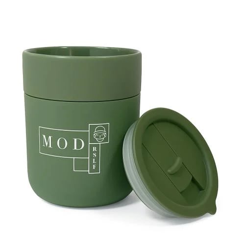 Green ceramic mug with plastic lid