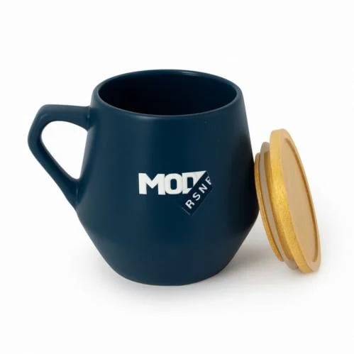 Blue ceramic mug with wooden lid