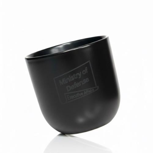 small black ceramic mug