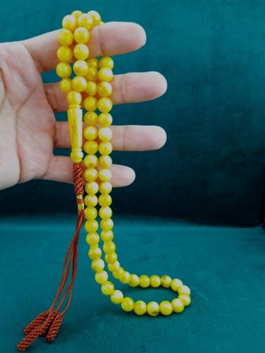 A rosary with 66 beads.