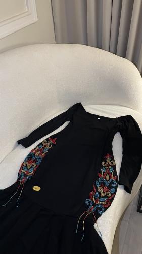 Black stretch dress original with embroidery and tears from below