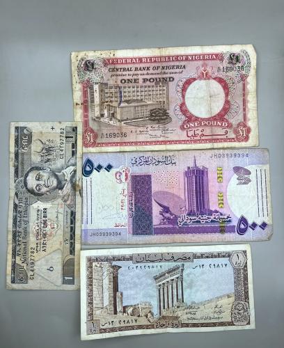 4 قطع عملات عالمية متنوعة N51
