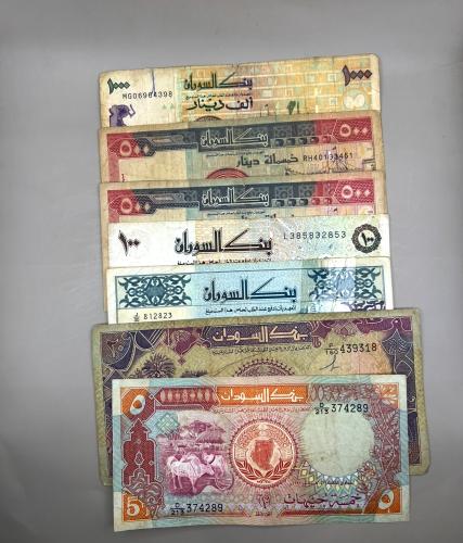 7 قطع عملات السودان متنوعة S84