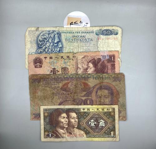 4 قطع عملات عالمية مختلفة x15