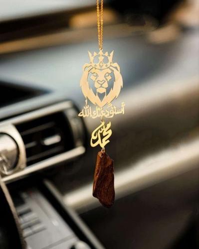 A car decoration with the name in the form of a li...