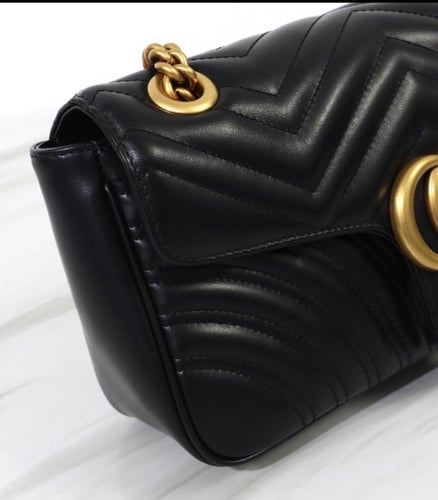 شنطة "قوتشي " نسائيه