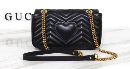 شنطة "قوتشي " نسائيه