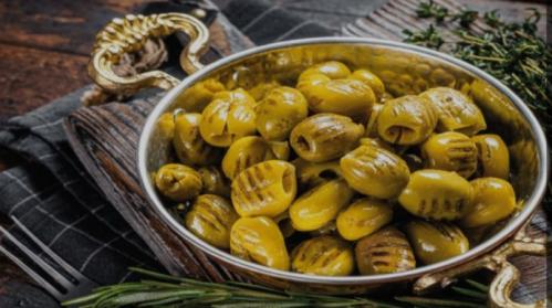 Grilled green olives