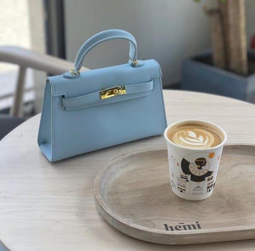 سمول هاندباق | pastel blue hardware gold