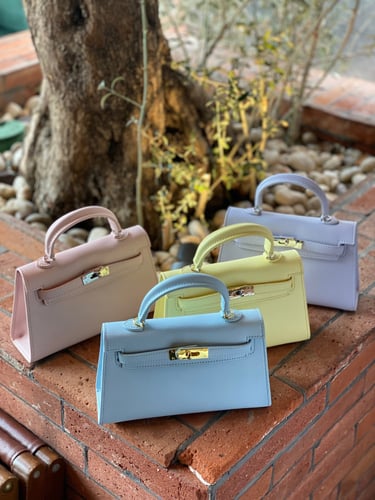 سمول هاندباق | pastel blue hardware gold