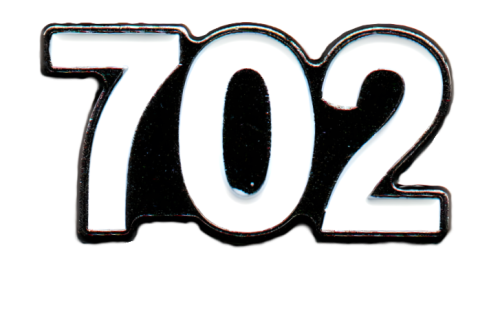 ملصق زهراني 702 المعدني