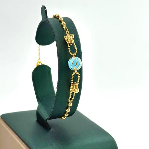 طقم ذهب جنزير مع لون الميناء سماوي ( 16.4 جرام - ع...