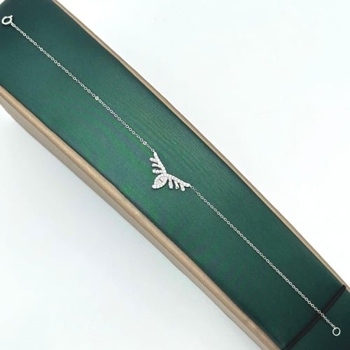 طقم بريق الانوثة ابيض تصميم الماس ( 5.4 جرام - عيا...