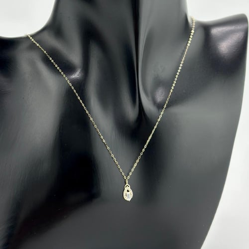 عقد ذهب عيار 18 على شكل بيضاوي ( 0.4 جرام - NE0101...