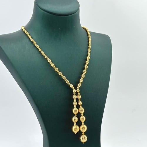 طقم ذهب عيار 21 – تصميم ناعم بكرات ليزر لامعة (SE0...