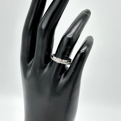 خاتم تونز ابيض مّزين بقصة سوليتير ( عيار 18 - RI05...