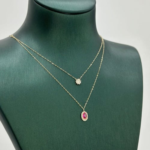 عقد دورين ناعم على شكل بيضاوي ( 0.7 جرام - عيار 18...