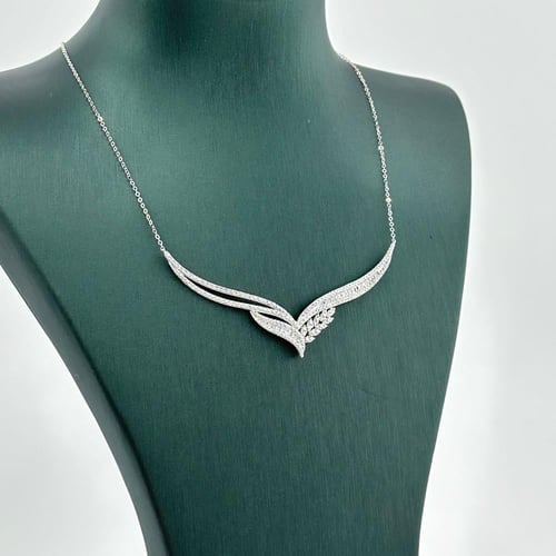 طقم سنابل مطعّم بقصات الباقييت ( 7.5 جرام - عيار 1...