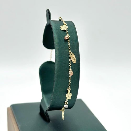 طقم تشوكر مميز بشكل الورود ( 3.7 جرام - عيار 18 -...