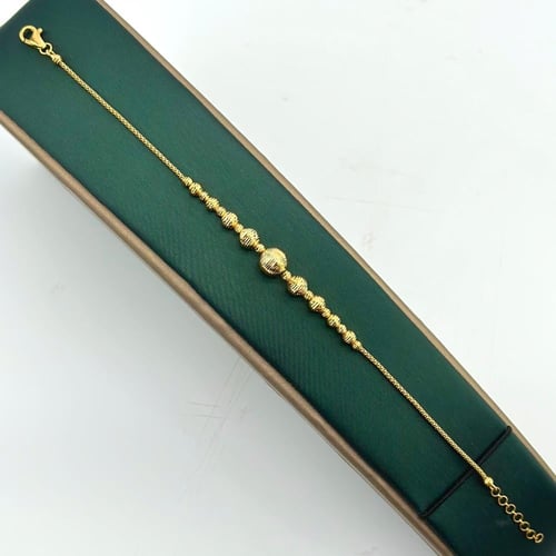 طقم ذهب عيار 21 – تصميم ناعم بكرات ليزر لامعة (SE0...