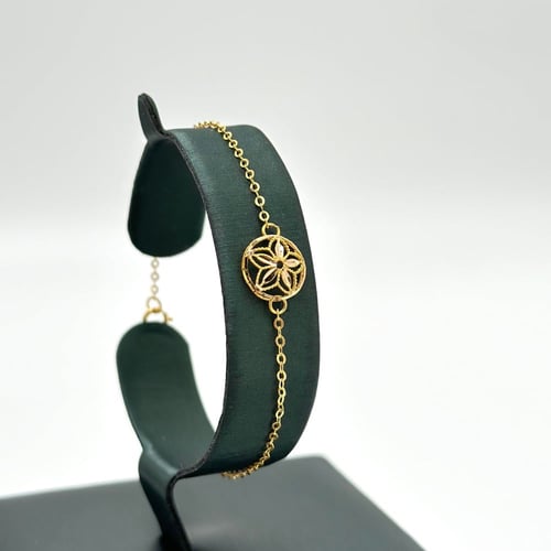 طقم الزهرة الذهبية كلاسيك ( 15.5 جرام - عيار 21 -...