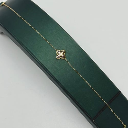 سوارة ناعمة وردة تصميم ايطالي ( 0.8 جرام - عيار 18...