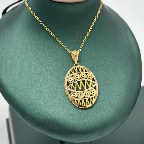 نصف طقم بتصميم بيضاوي مميز ( 4.8 جرام - عيار 21 -...