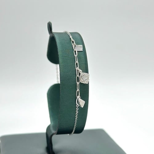 طقم ابيض مميز مطعّم بقصّات الباقييت ( 6.2 جرام - ع...