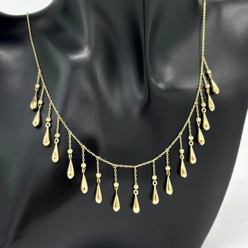 عقد قطرات من ذهب مطعّم بكرات الذهب ( 7.9 جرام - عي...