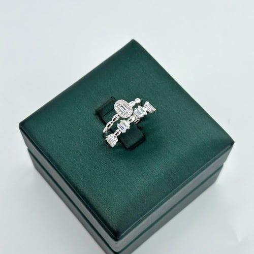 خاتم تصميم الماس مطعّم بقصات الباقييت (2.4 جرام -...