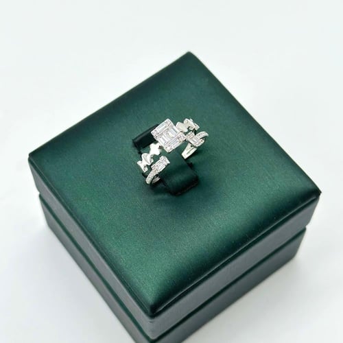 خاتم تصميم الماس بقصات الباقييت ( 2.1 جرام - عيار...