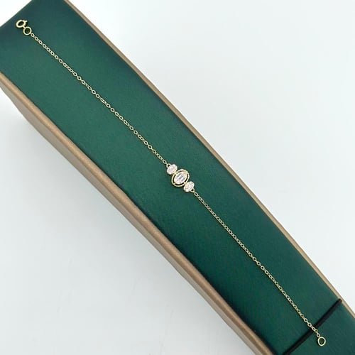 طقم ذهب أصفر تصميم الماس مّطعم بالباقيت ( 11.1 جرا...