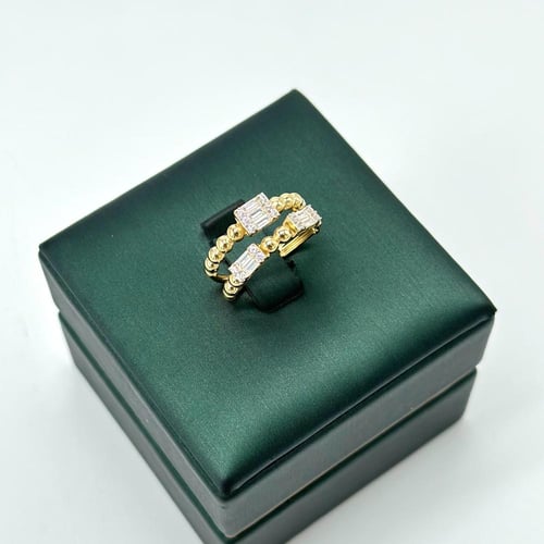 خاتم تصميم الماس مطعّم بقصات الباقييت ( 2.7 جرام -...