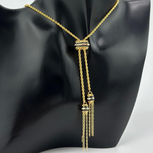 عقد متحرك مطعّم بالوان المينا ( 6.0 جرام - عيار 21...