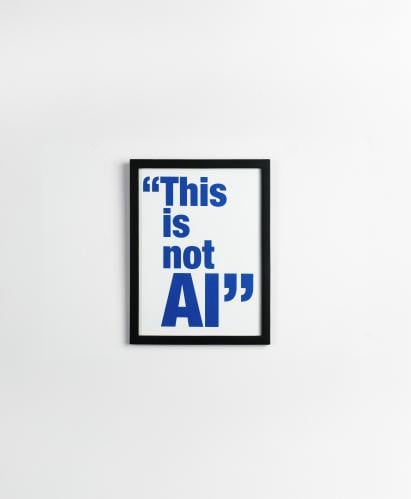 لوحة This Is Not AI | تصميم جرافيكي عصري بإطار أسو...