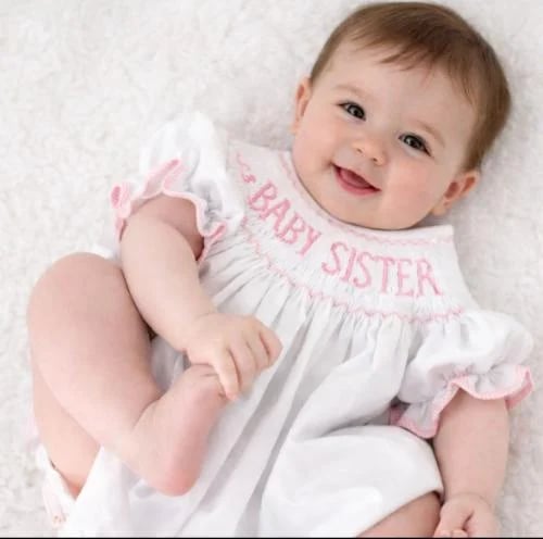 Elegant romper for the newborn girl
