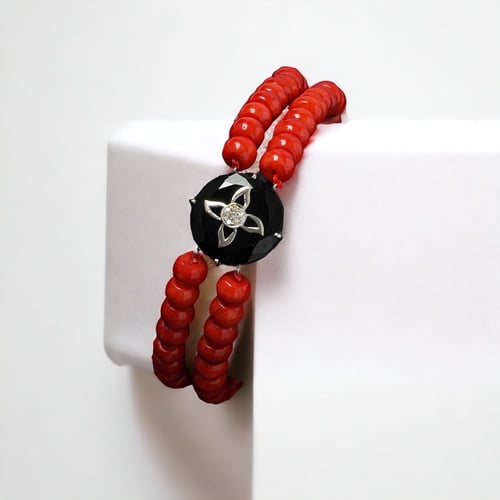 مجموعة المرجان الأحمر والأونيكس بالألماس