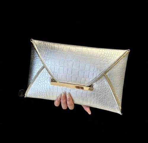 كلتش مناسبات فضي فاخر بنقشة جلد – شنطة سهرة نسائية...