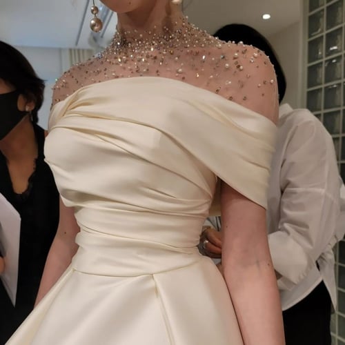 فستان كلوش مرصع باللولو فخم