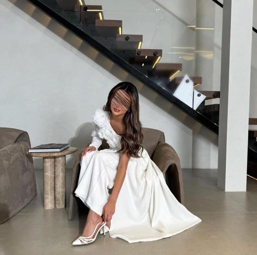 طقم أبيض فاخر بتفاصيل دانتيل راقية