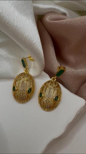 Bulgari earrings gold with green stone stones