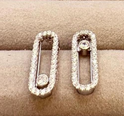 Messika gold earrings