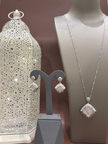 Roberto Coin silver set in white color