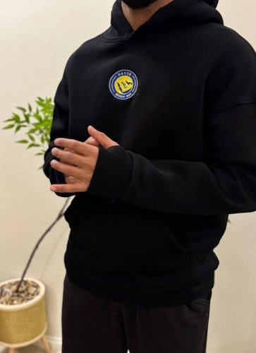 بلوفر نادي النصر شتوي – تصميم أنيق للمشجعين