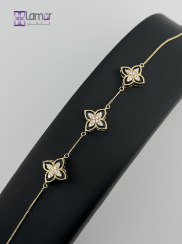 Z18SNBS12 أسوارة نجمة لمار عيار 18 مُطعم بحجر أسود...