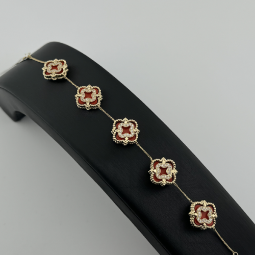 Z18SNBS195 أسوار ذهبي عيار 18 مُطعم بحجر احمر طبيع...