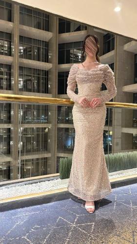 فستان سهرة ذهبي