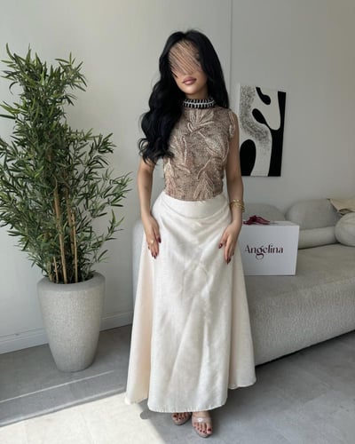 طقم تنوره بلوزه بيج وبني G294