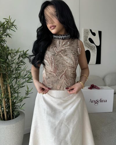 طقم تنوره بلوزه بيج وبني G294